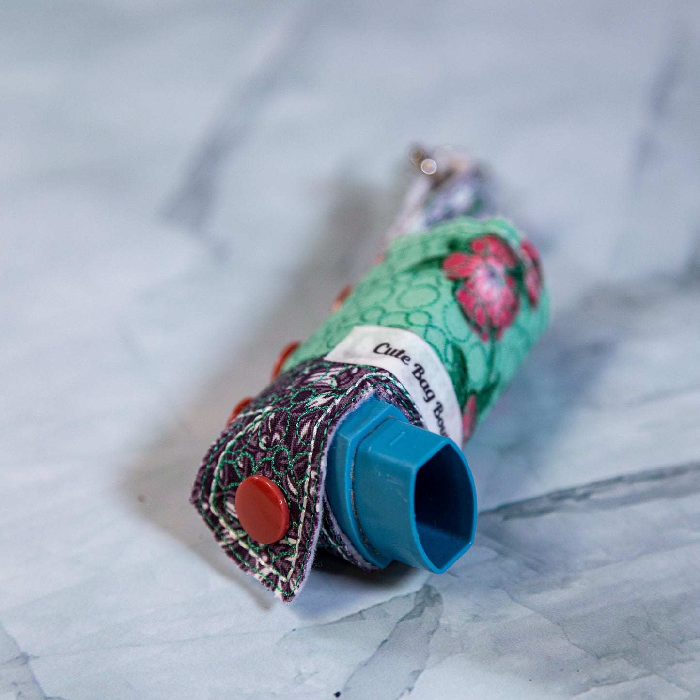 Green and Purple Inhaler Cover