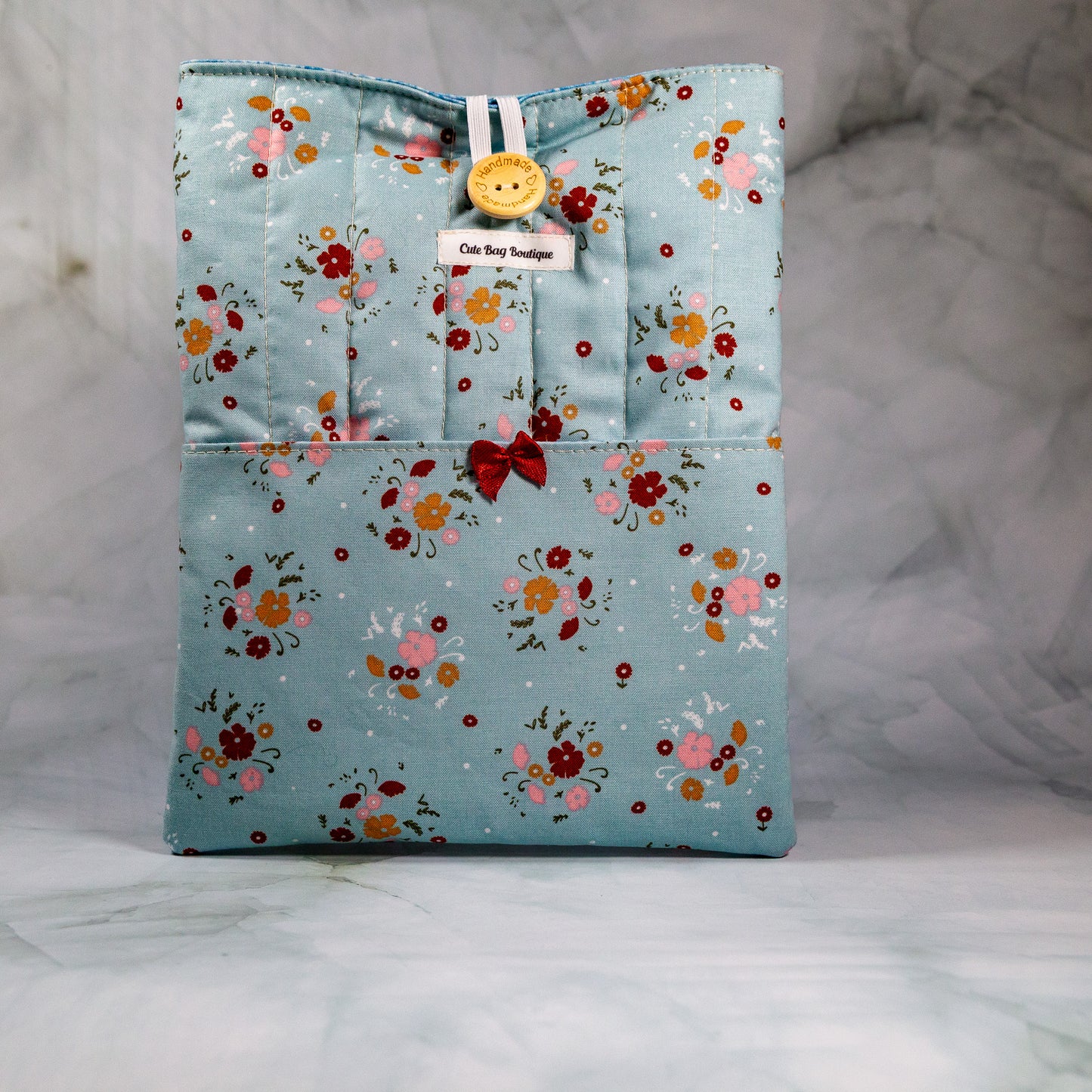 Sage Floral Quilted Book Sleeve